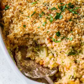 a spoon scooping Vegetarian Broccoli Rice Casserole