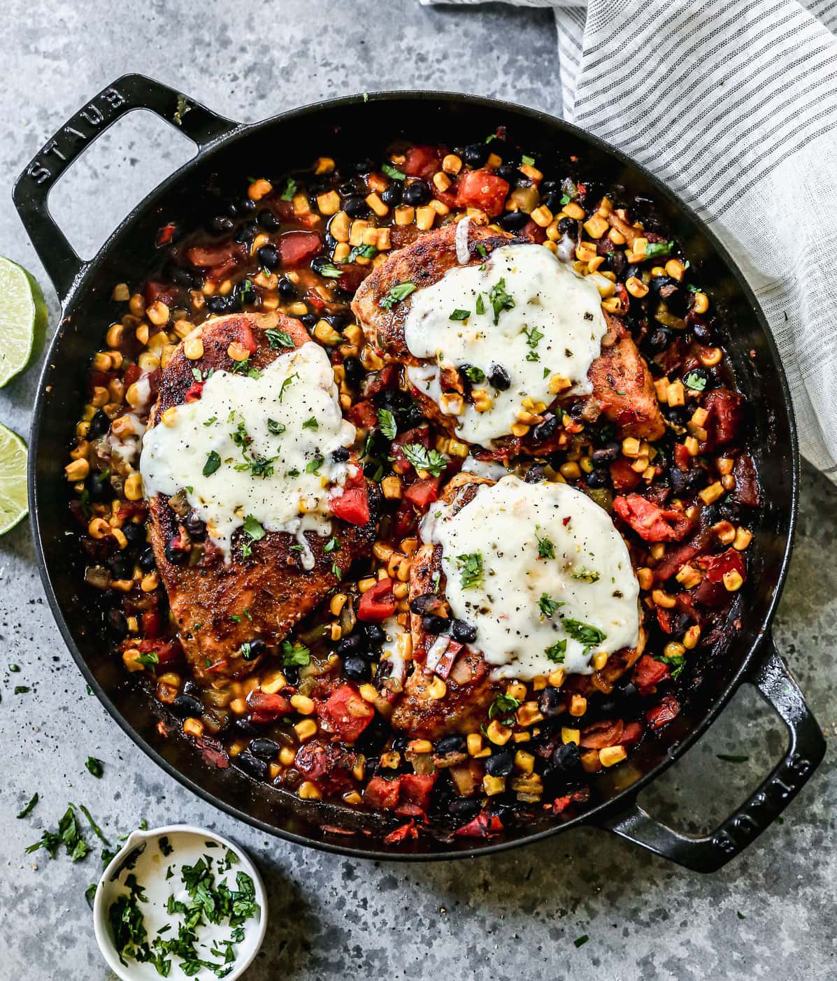 A cast iron skillet with cowboy chicken