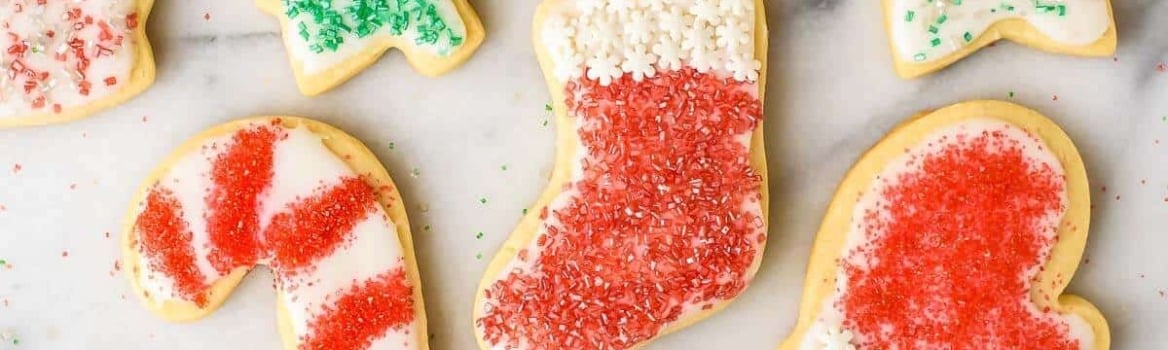 Soft and fluffy Cream Cheese Sugar Cookies with Perfect Icing. The only cut out cookie recipe you will ever need!