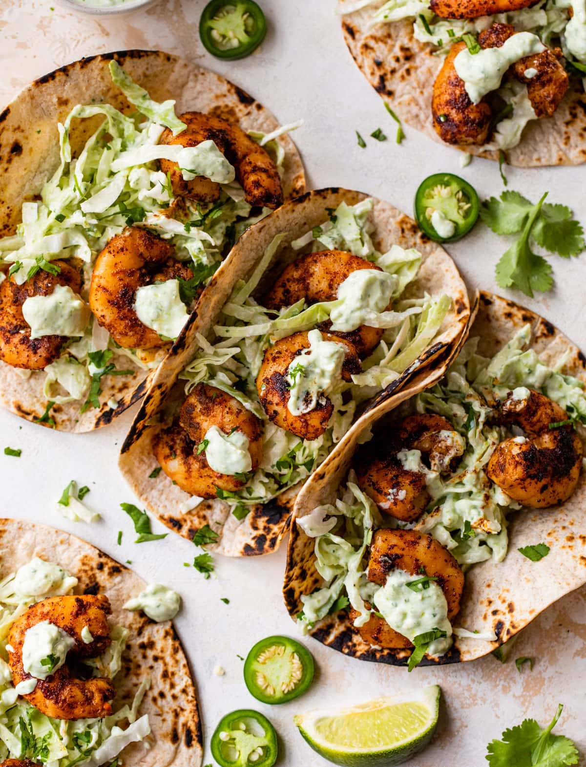 Five shrimp tacos with creamy taco slaw