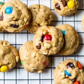 A stack of trail mix cookies with peanuts and chocolate