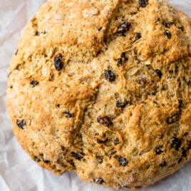 a loaf of fluffy irish soda bread with raisins